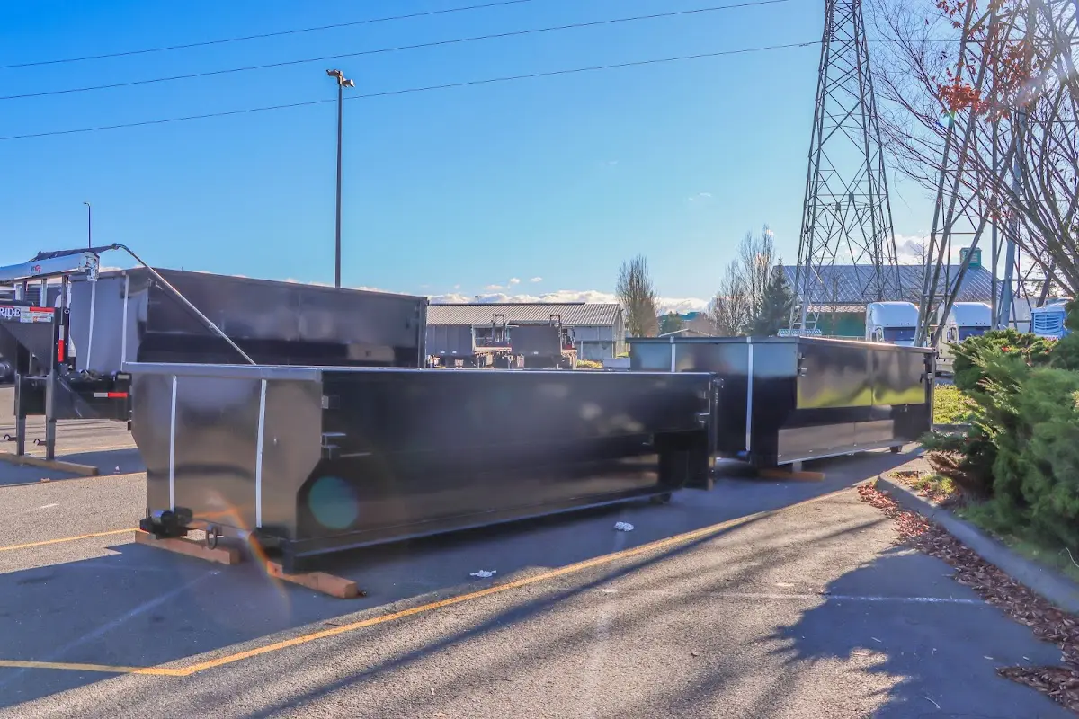 Roll-off dumpster ready for waste disposal at job site for Construction Dumpster Rental in Oakland